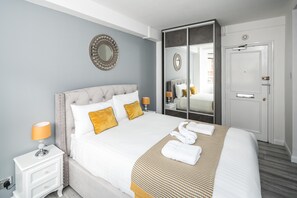 Departamento (0 Bedroom) | Tabla de planchar con plancha, wifi gratis y ropa de cama