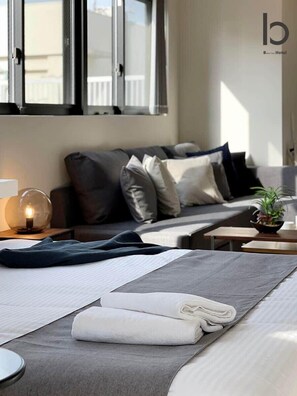 TV, offices - b hotel Neko Yard | Compact & Modern Loft Stay (Naka Ward, Hiroshima)