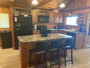 Fridge, microwave, oven, stovetop - Beautiful Up North Lake Front Home on All Sports Clear Lake with BOAT Rental! (Atlanta)