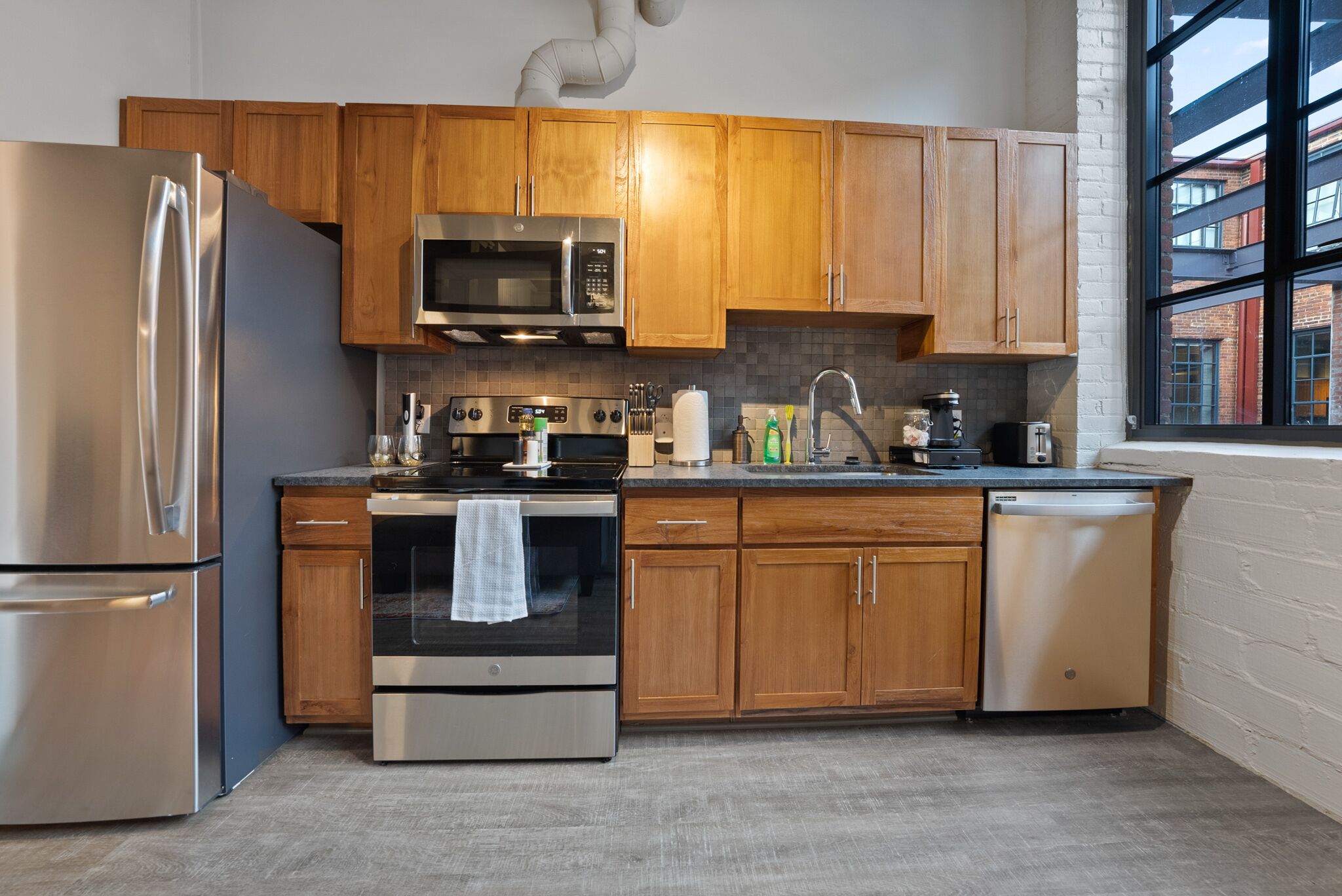 Elevate Your Lifestyle with Our Modern and Elegant Industrial Loft Apartments 21