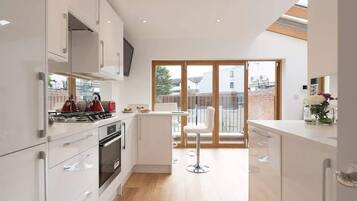 Apartment | Private kitchen | Fridge, microwave, oven, stovetop