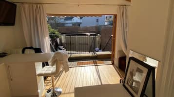 Apartment | Living room | 30-inch TV with digital channels