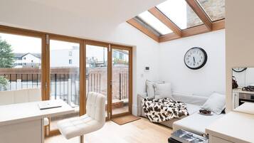 Apartment | Living room | 30-inch TV with digital channels