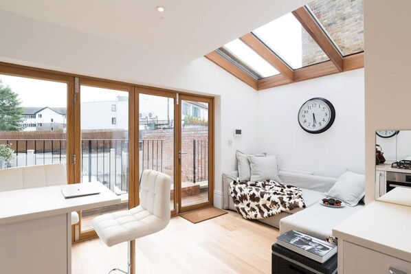 Apartment | Living room | 30-inch TV with digital channels