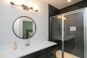 Bathtub, hair dryer, towels, soap