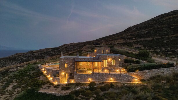 A stone house with multiple rooms and a pool, surrounded by rocky terrain and sparse vegetation. - Infinity Villa, luxury house with stunning view in Serifos (Serifos)