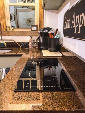 Fridge, microwave, stovetop, coffee/tea maker