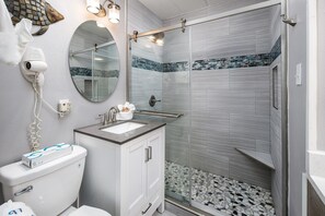 Shower, hair dryer, towels