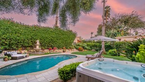 A backyard with a swimming pool, hot tub, and outdoor seating area. - Casa Paradiso: Private Montecito Garden Estate (Santa Barbara)