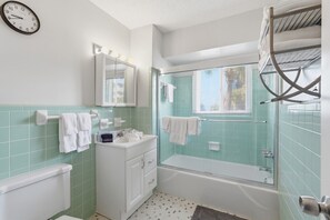 Shower, hair dryer, towels