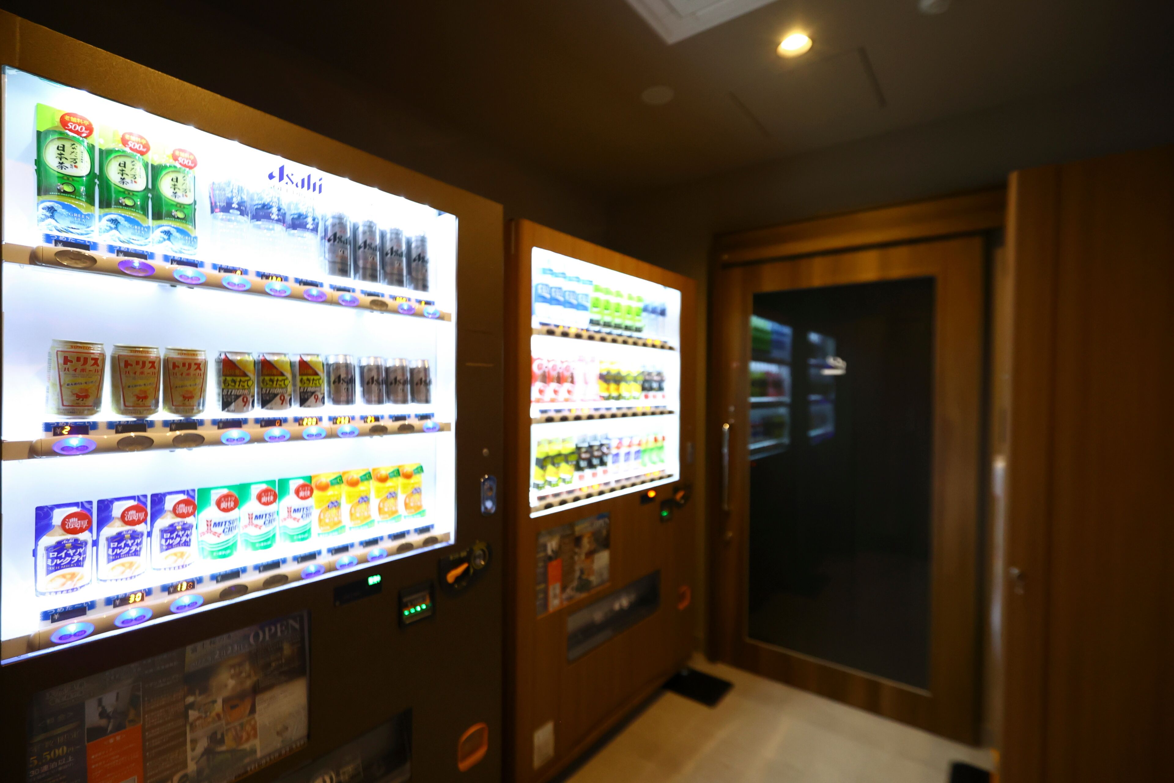 Vending machines with various beverages and snacks.