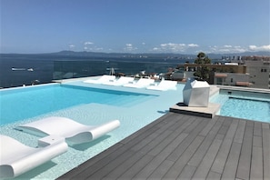 An infinity pool, a rooftop pool - Casa SpaView at D'Terrace Residences (Puerto Vallarta)