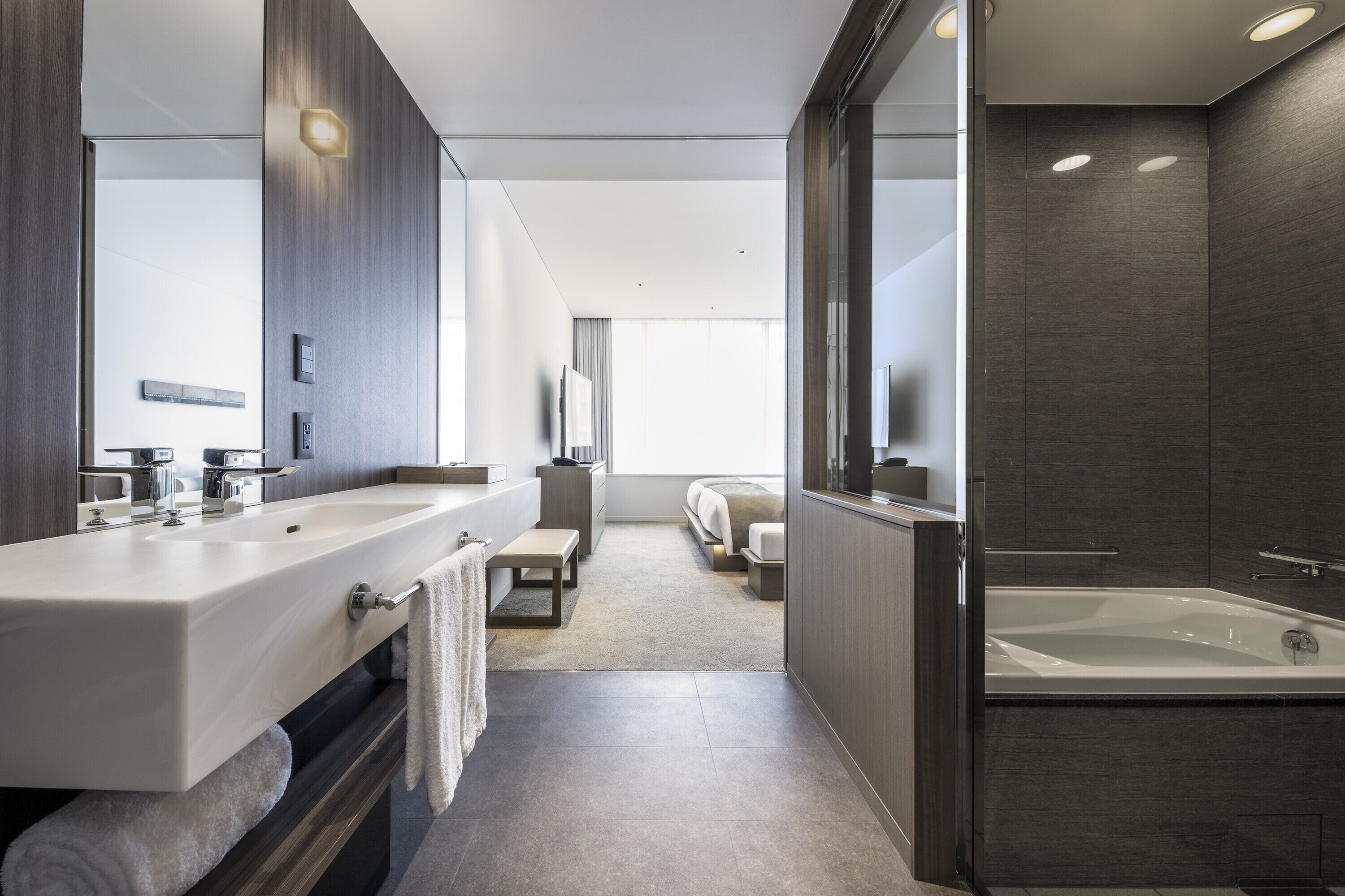 eco-friendly toiletries, hair dryer, slippers, electronic bidet