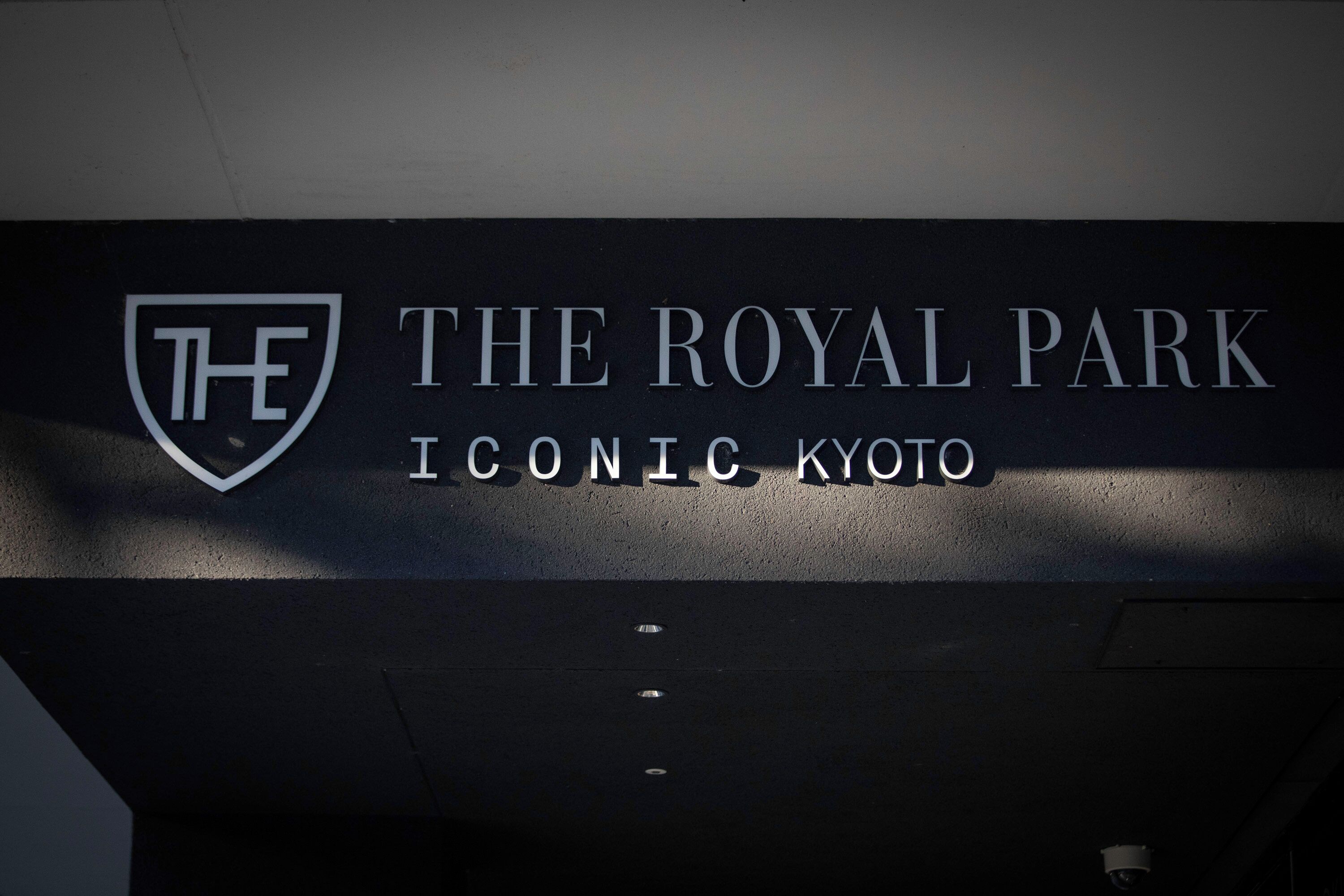 A sign with the text 'THE ROYAL PARK ICONIC KYOTO'.