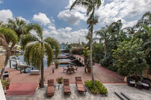 Terrace/patio - Tropical Waterfront Resort Home with Marina, Kayaks, Piano, Game Room (New Port Richey)