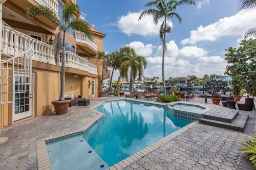 Tropical Waterfront Resort Home with Marina, Kayaks, Piano, Game Room