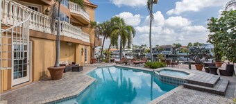 Tropical Waterfront Resort Home with Marina, Kayaks, Piano, Game Room