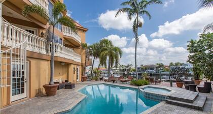 Tropical Waterfront Resort Home with Marina, Kayaks, Piano, Game Room