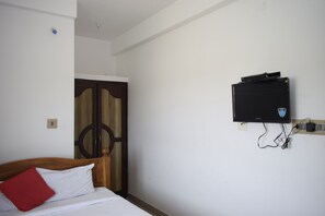 Ropa de cama hipoalergénica y tabla de planchar con plancha