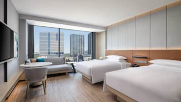 Premium bedding, down comforters, minibar, in-room safe