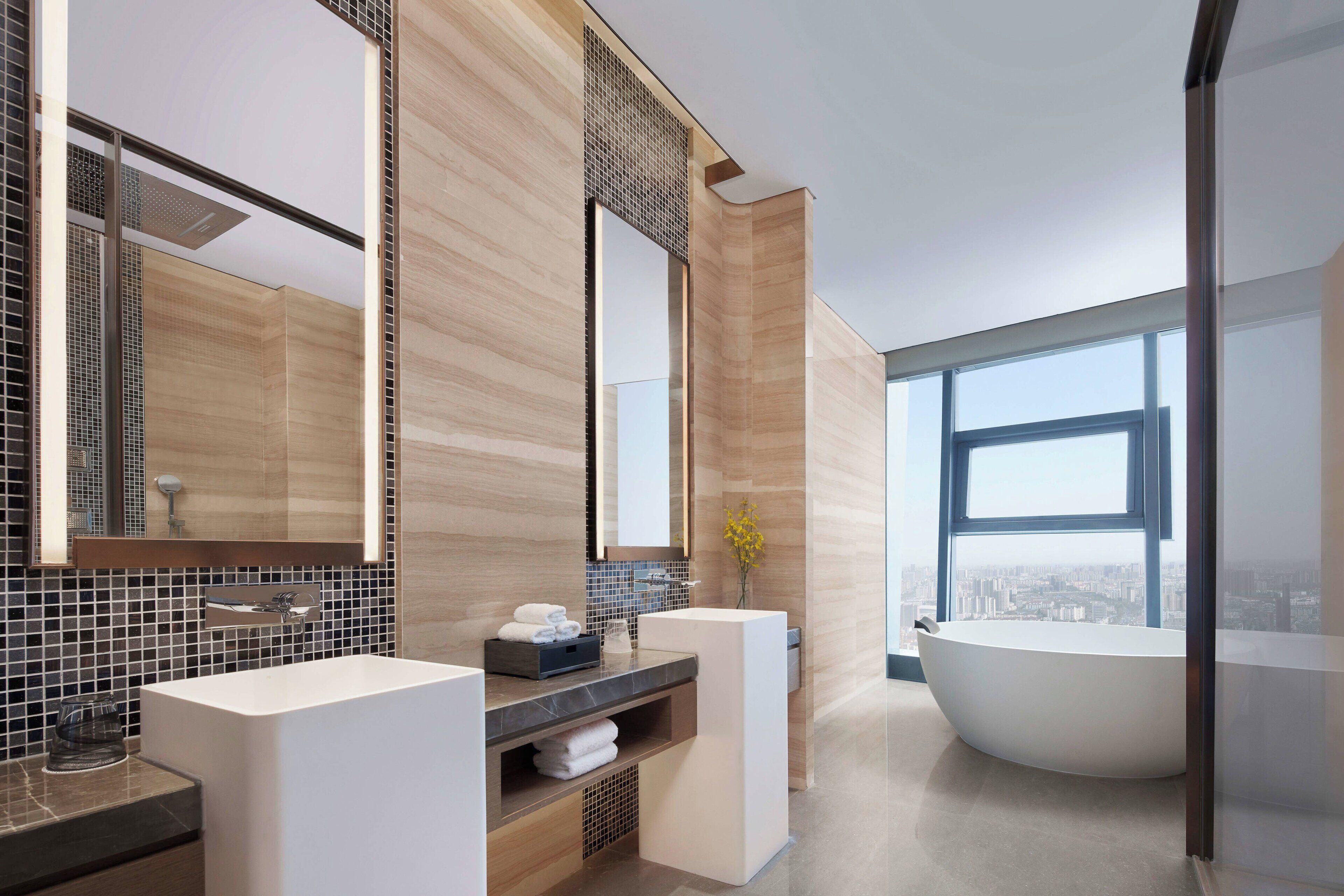 Separate bathtub and shower, free toiletries, hair dryer, bathrobes