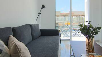 45-inch flat-screen TV with cable channels, TV