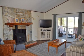 Smart TV, fireplace - Holly House | 3BR Canal Front Home with Private Dock, Screened Porch and Boat Launch (Chincoteague)