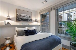 2 bedrooms, desk, iron/ironing board, travel crib