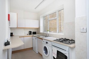 Full-size fridge, oven, dishwasher, toaster