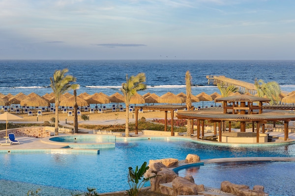 Private beach, beach umbrellas, beach towels, beach volleyball