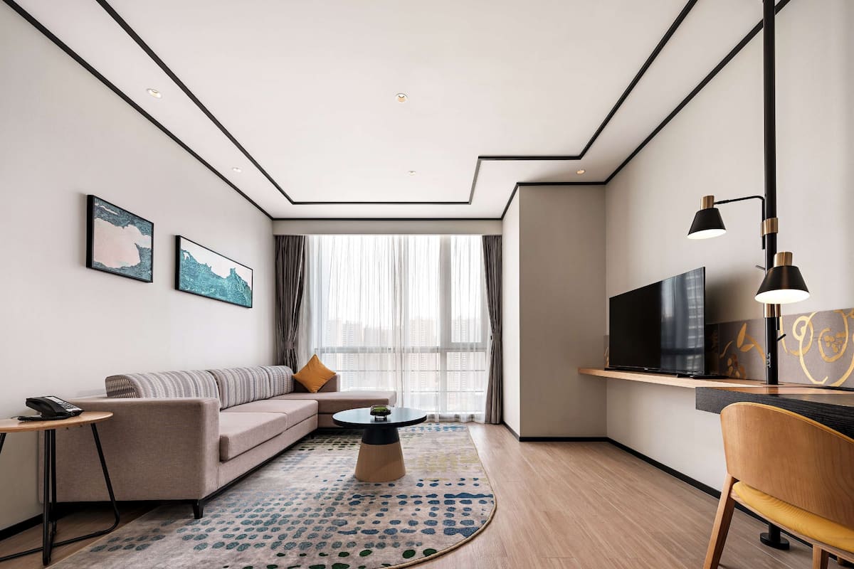 City suite, 1 kingsize bed | Donzen dekbedden, bedden met traagschuimmatras, een kluis op de kamer