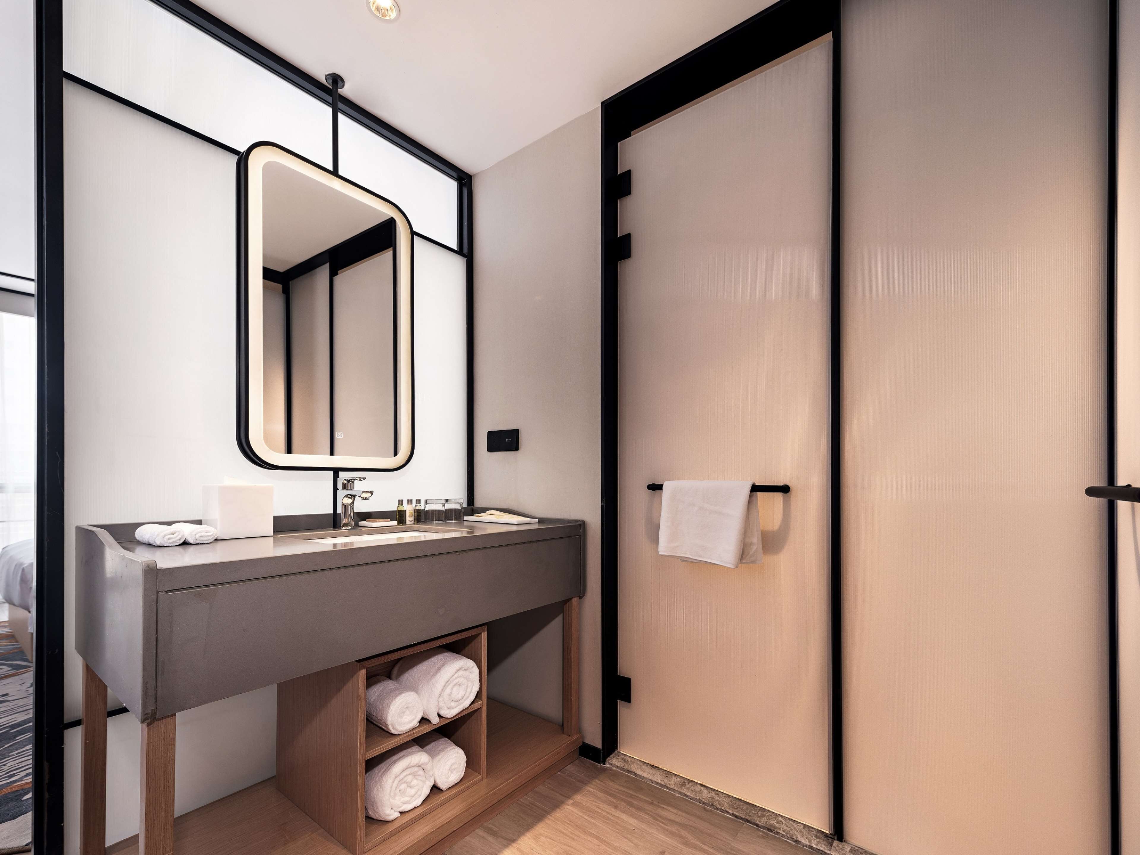 Shower, rainfall showerhead, designer toiletries, hair dryer