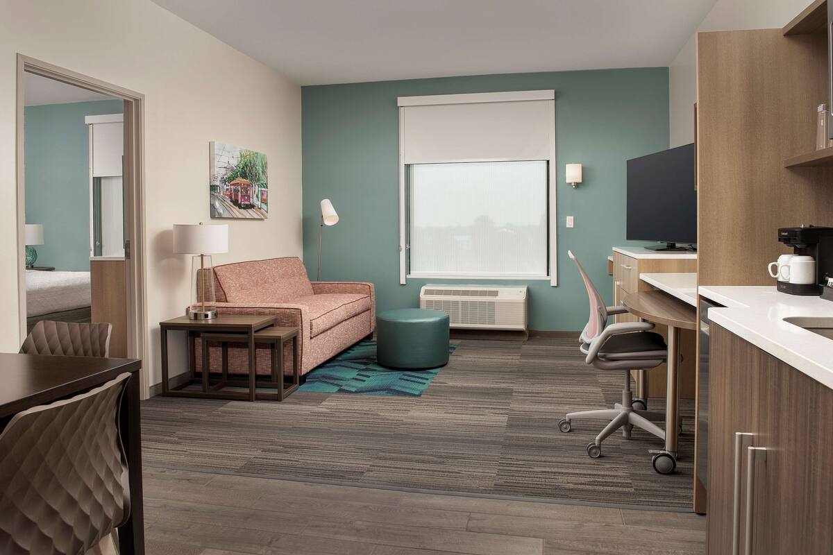 desk, laptop workspace, blackout curtains, iron/ironing board