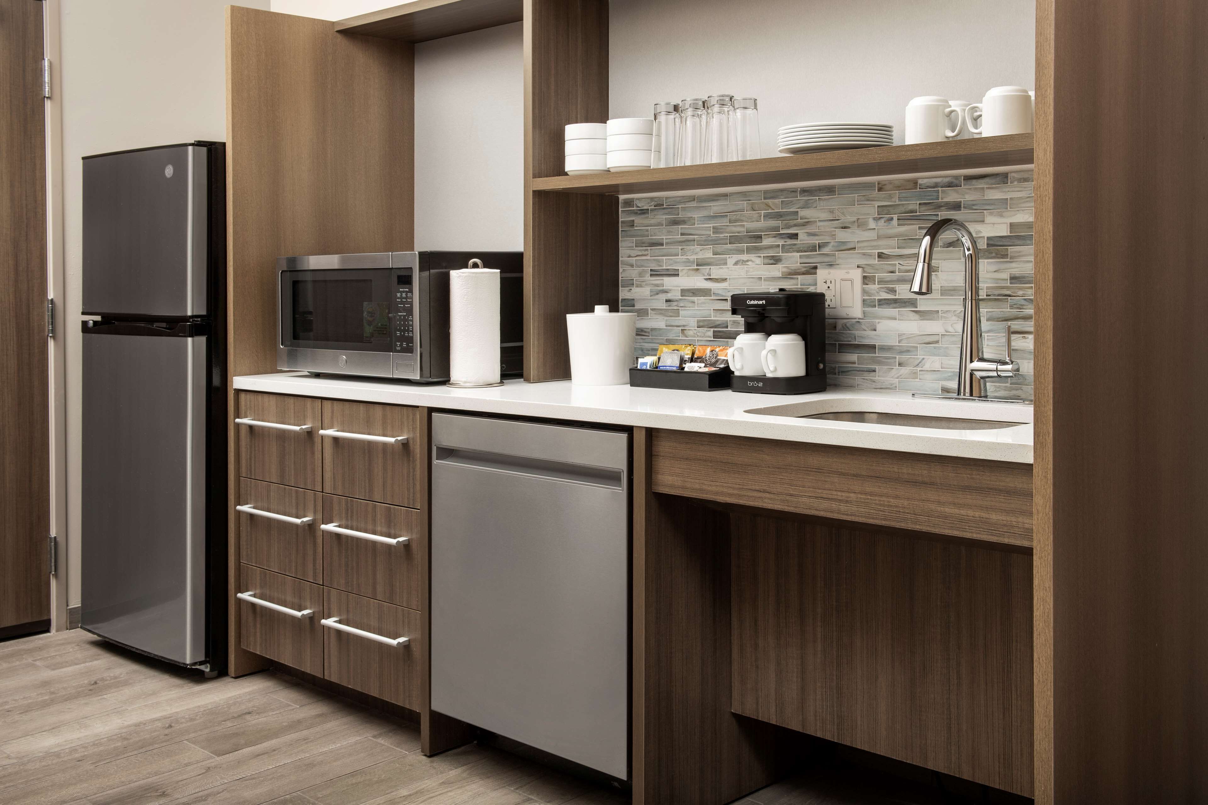 full-sized fridge, microwave, dishwasher, coffee/tea maker