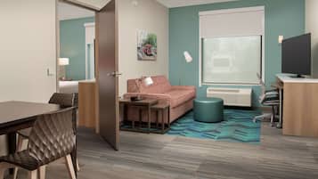 Suite, 1 King Bed, Accessible (Mobility & Hearing, Roll-in Shower) | Desk, laptop workspace, blackout drapes, iron/ironing board