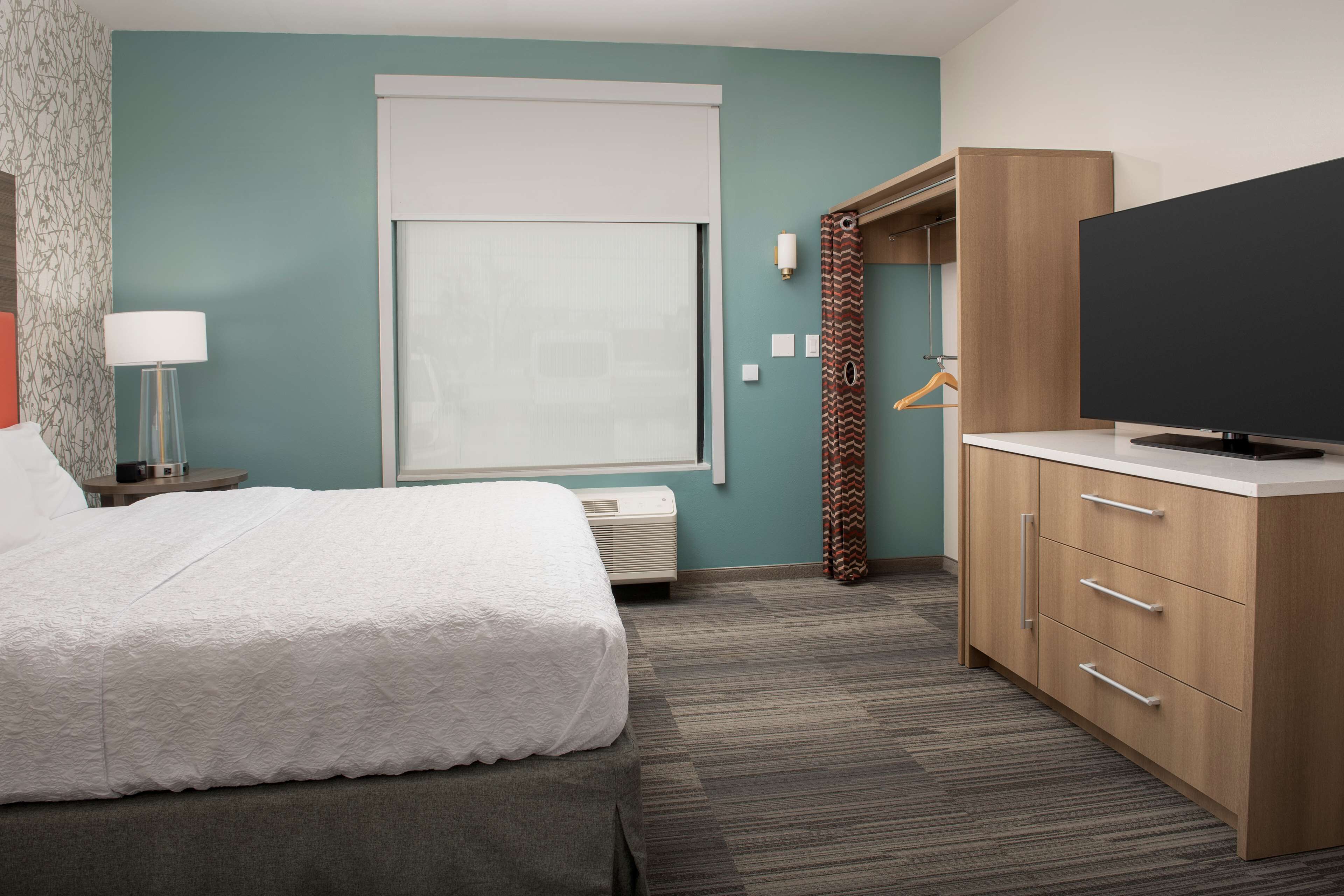 suite, 1 king bed, accessible (mobility & hearing, roll-in shower) | desk, laptop workspace, blackout curtains, iron/ironing board