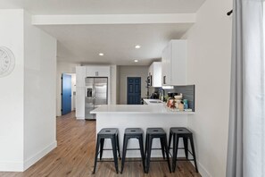 Fridge, microwave, oven, stovetop - Spacious, pet-friendly home near downtown Spokane—sleeps 14. (Spokane)