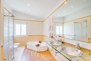 Bathtub, hair dryer, towels