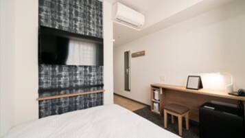 1 室のベッドルーム、デスク、WiFi (無料)、ベッドシーツ