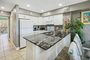 Fridge, microwave, dishwasher, coffee/tea maker