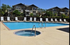 Enjoy a refreshing swim in the pool surrounded by a spacious deck.