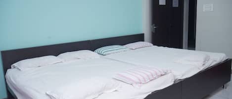 Family Room | Desk, bed sheets