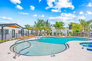 Outdoor pool, open 8:00 AM to 8:00 PM, pool umbrellas, sun loungers