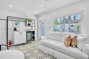 1 Bedroom King Suite | Living area | 55-inch Smart TV with digital channels, TV