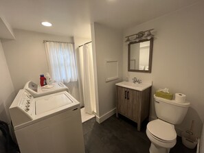 Combined shower/tub, toilet paper
