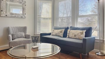 Condo (Ames for Fun) | Living area | 55-inch Smart TV with cable channels, TV, streaming services