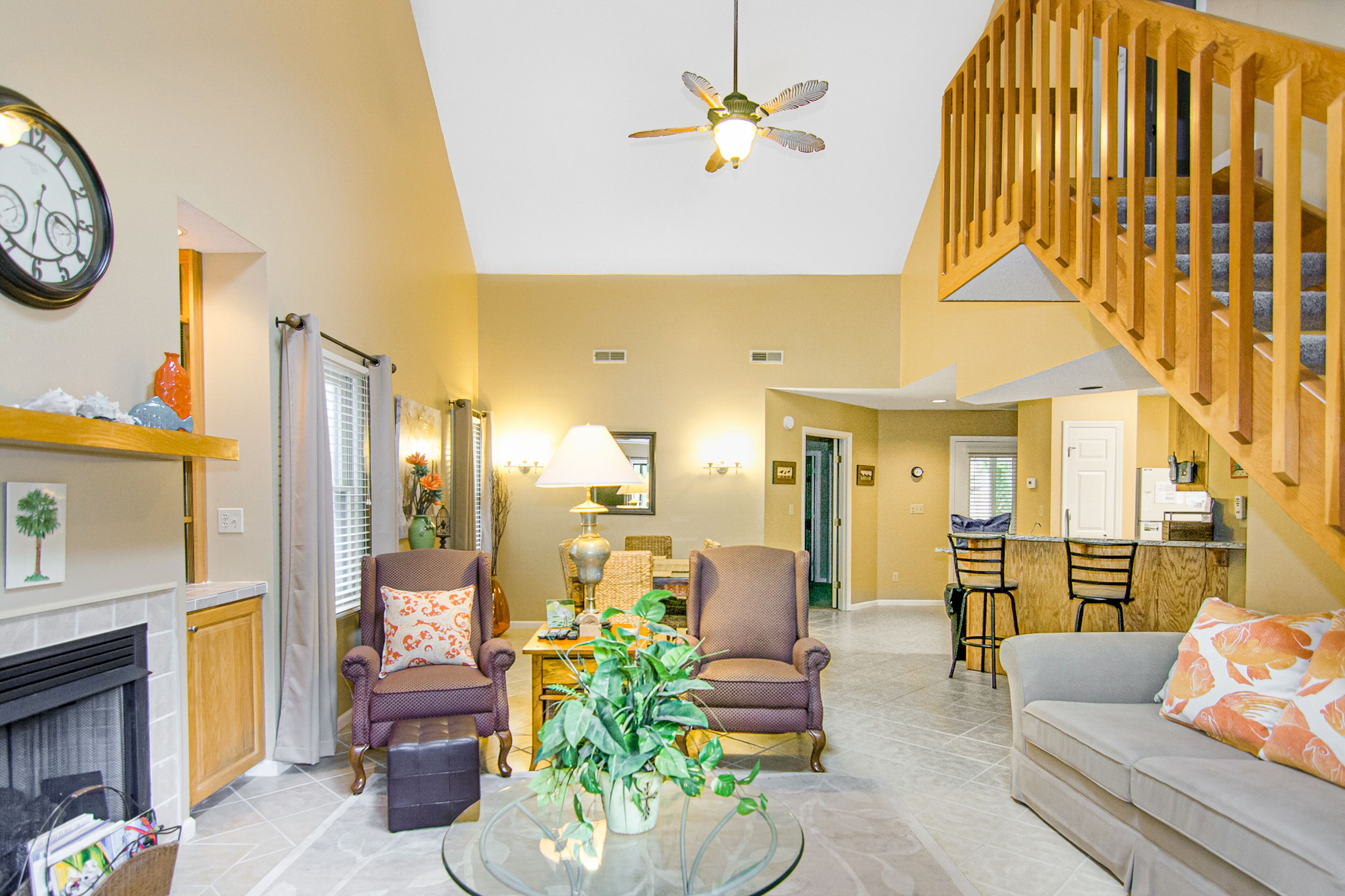 Updated, dog-friendly home with grill, W/D, screened porch, & central AC