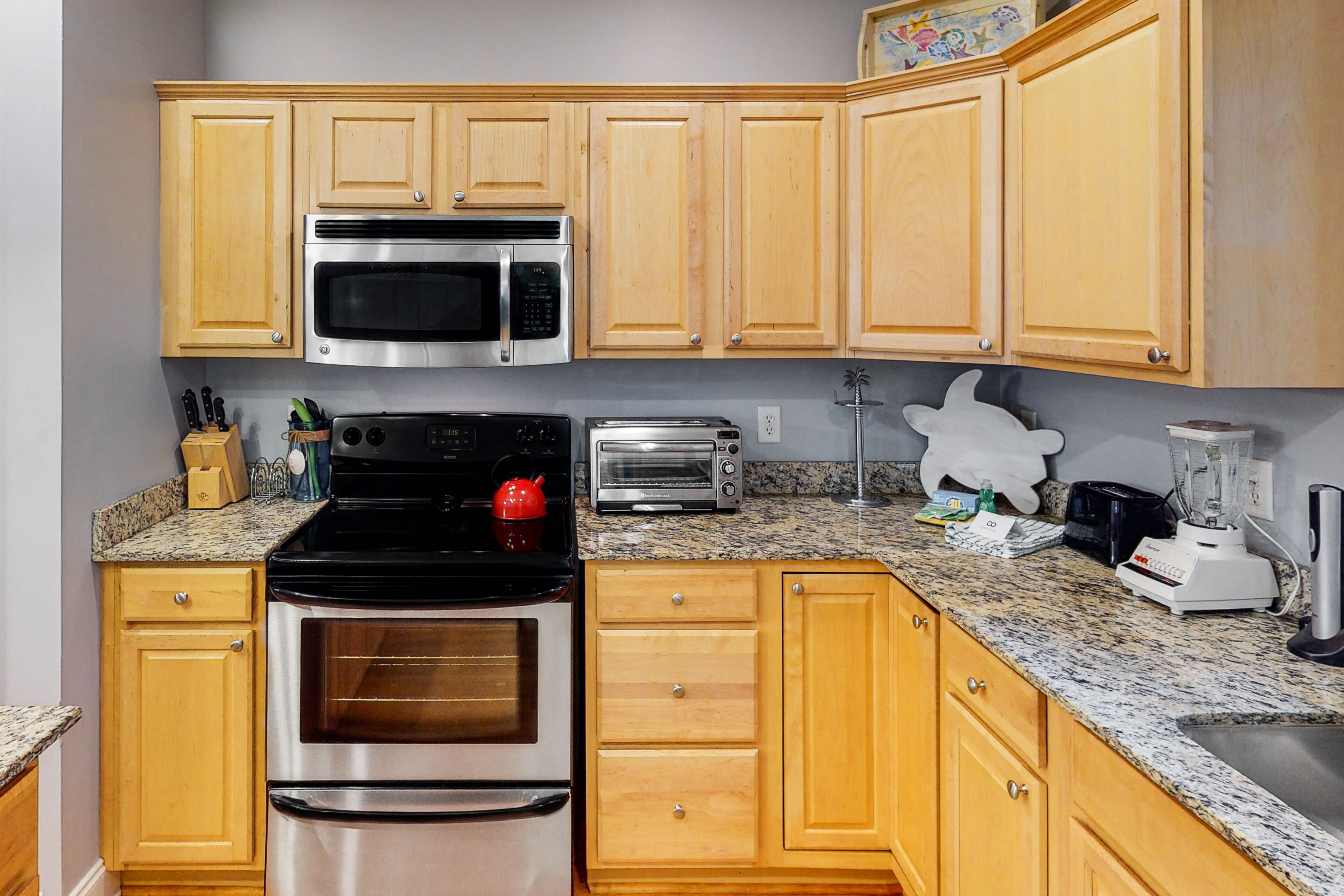 Sun-kissed home with AC, fireplace & W/D - short drive to the beach