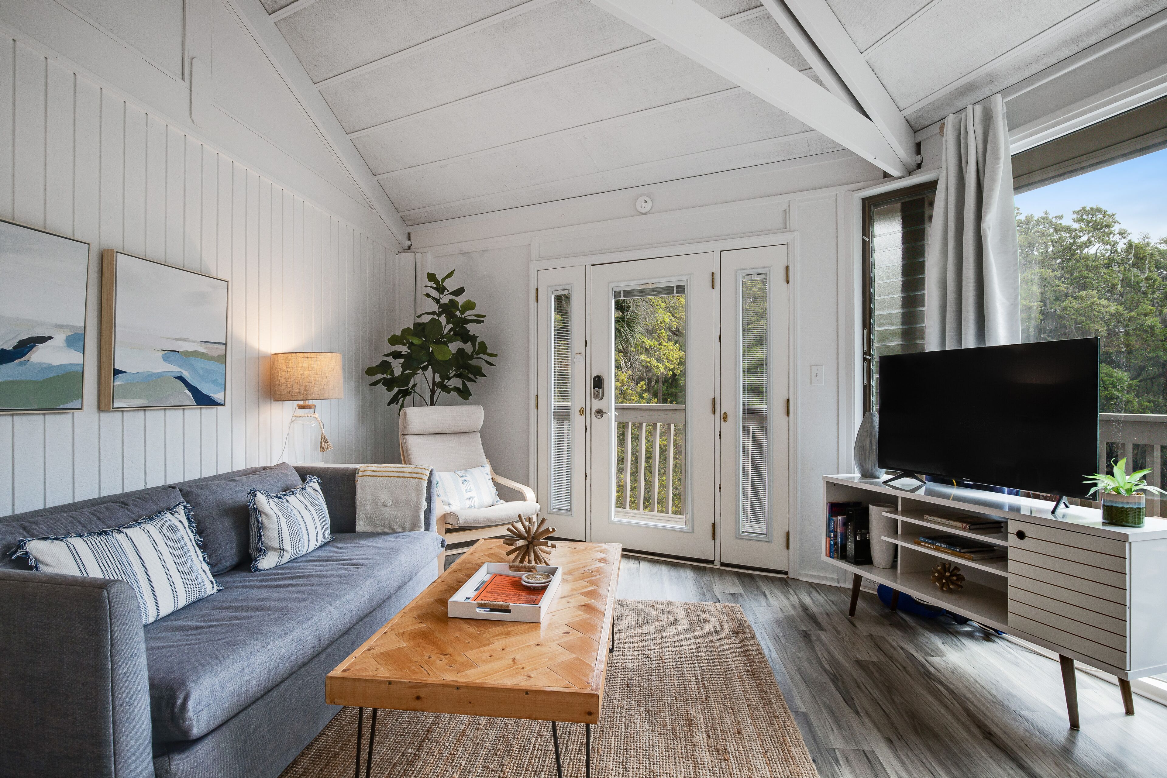 Lakefront home with lagoon view, deck & AC - close to beach, golf, & pools