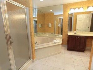 Bathtub, hair dryer, towels, soap